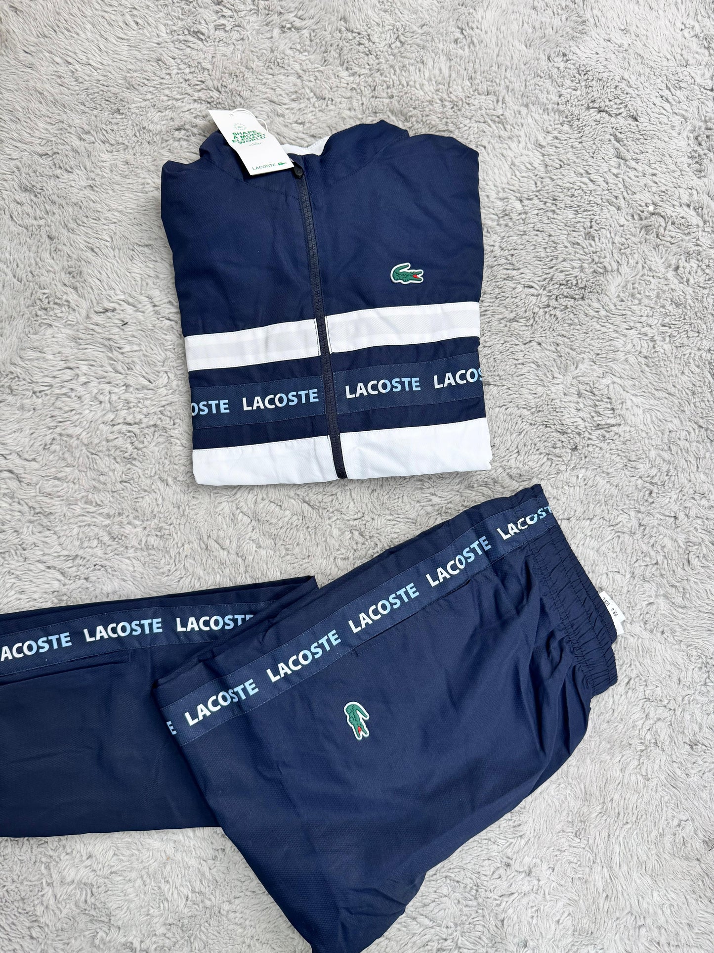 Chandal Lacoste azul marino y blanco logo verde