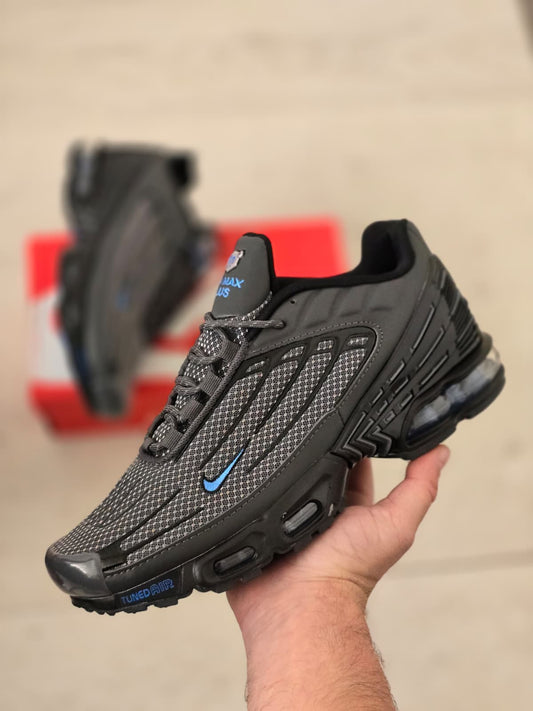 Tn plus gris logo azul