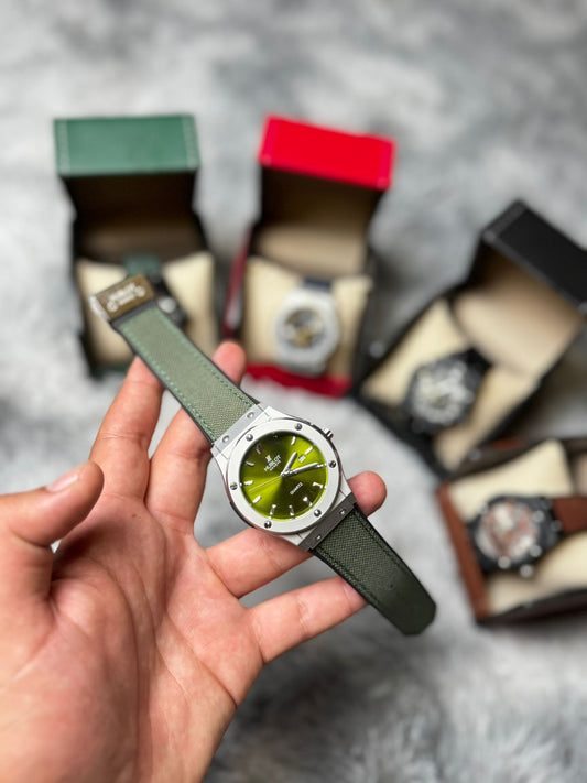 RELOJ HUBLOT verde y plateado