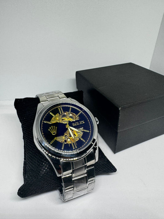 RELOJ ROLEX GRIS AZUL MARINO Y DORADO