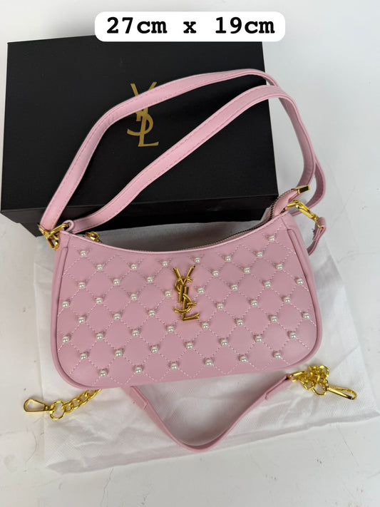 Bolso YSL rosa logo dorado detalles blancos