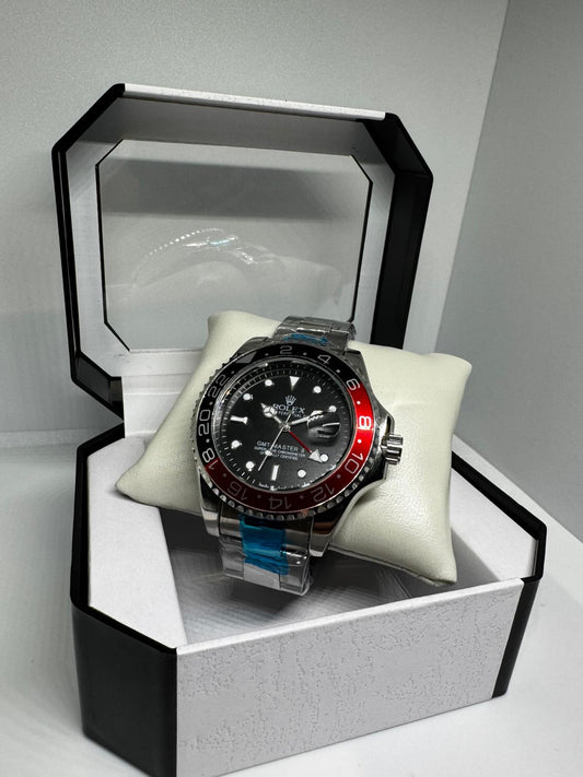 RELOJ ROLEX negro y rojo