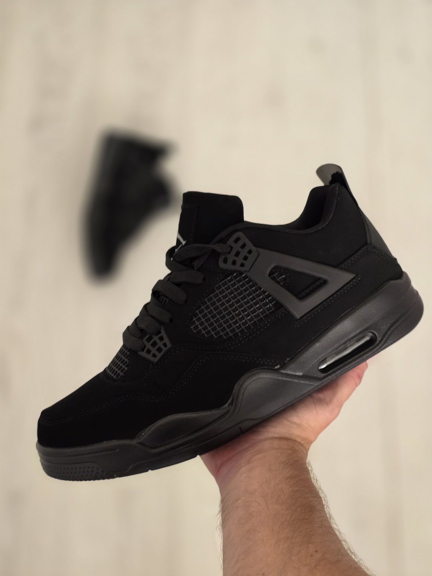 Jordan 4 negra