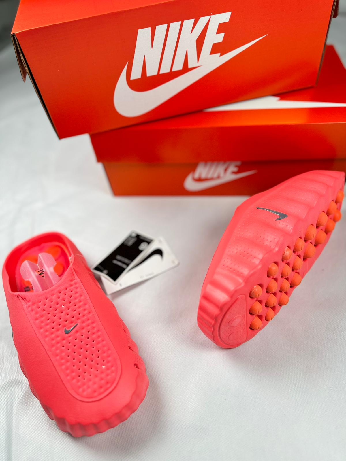Nike Mind 001 rojas logo plateado