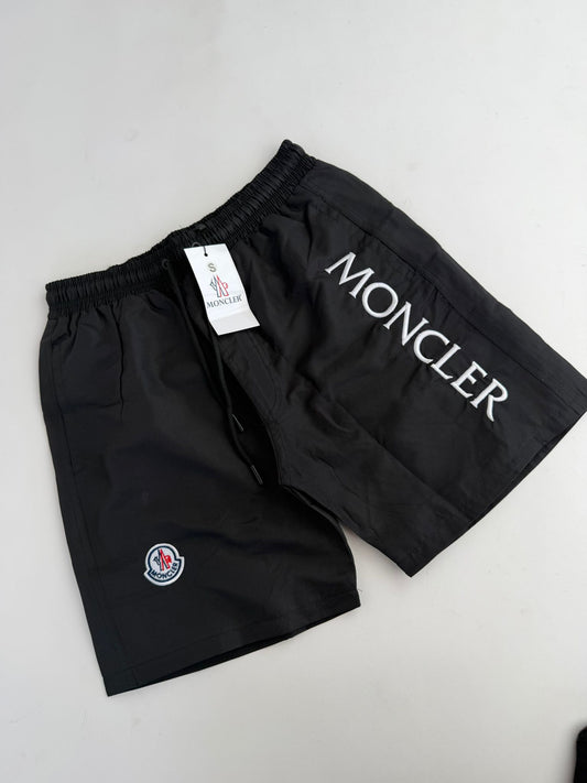Pantalon Corto Moncler negro logo blanco