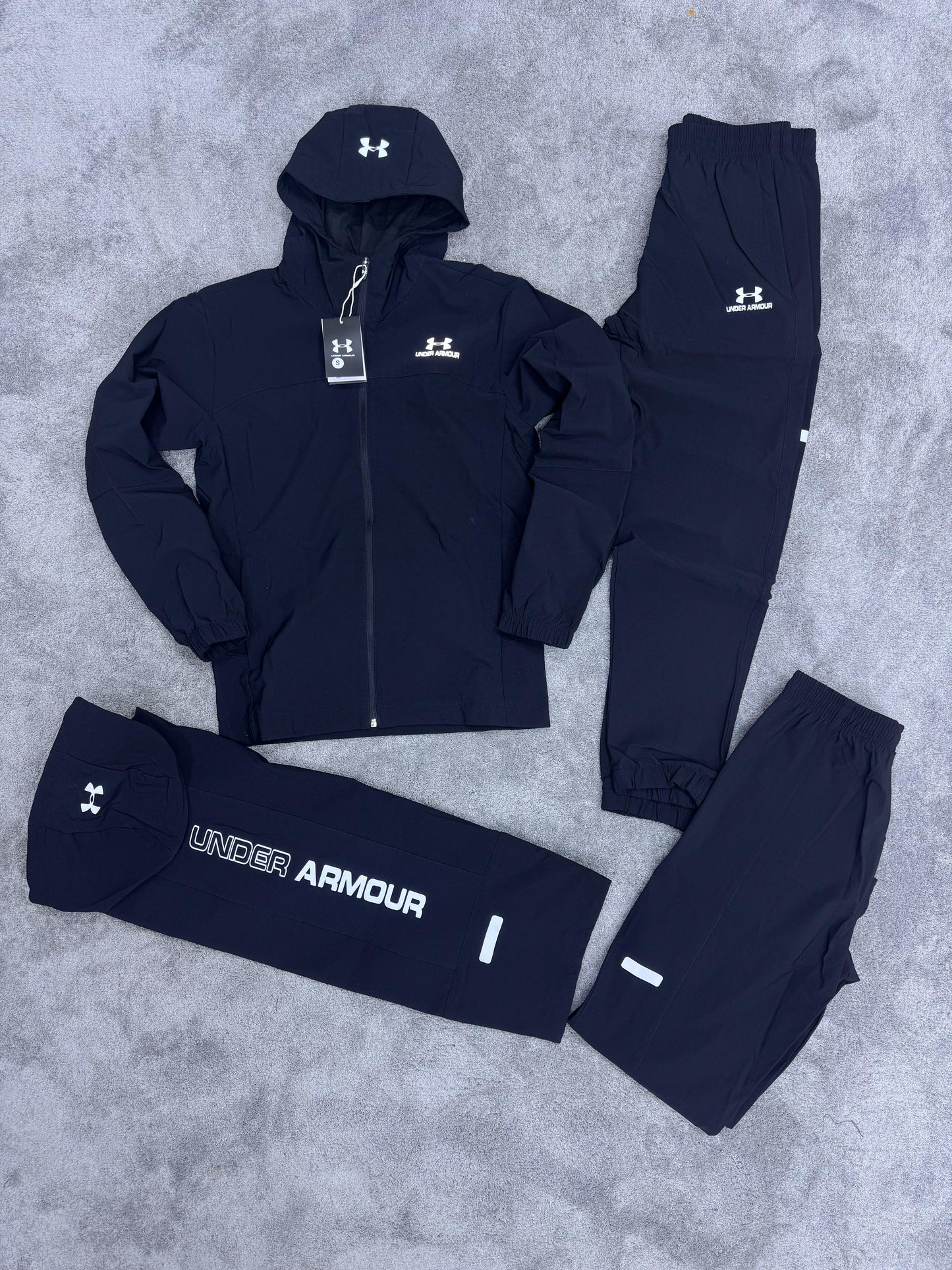 Chandal under armour negro logo blanco