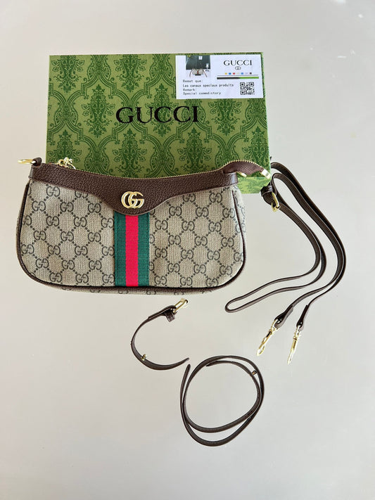 Bolso Gucci marron beige detalles verdes y rojos logo dorado