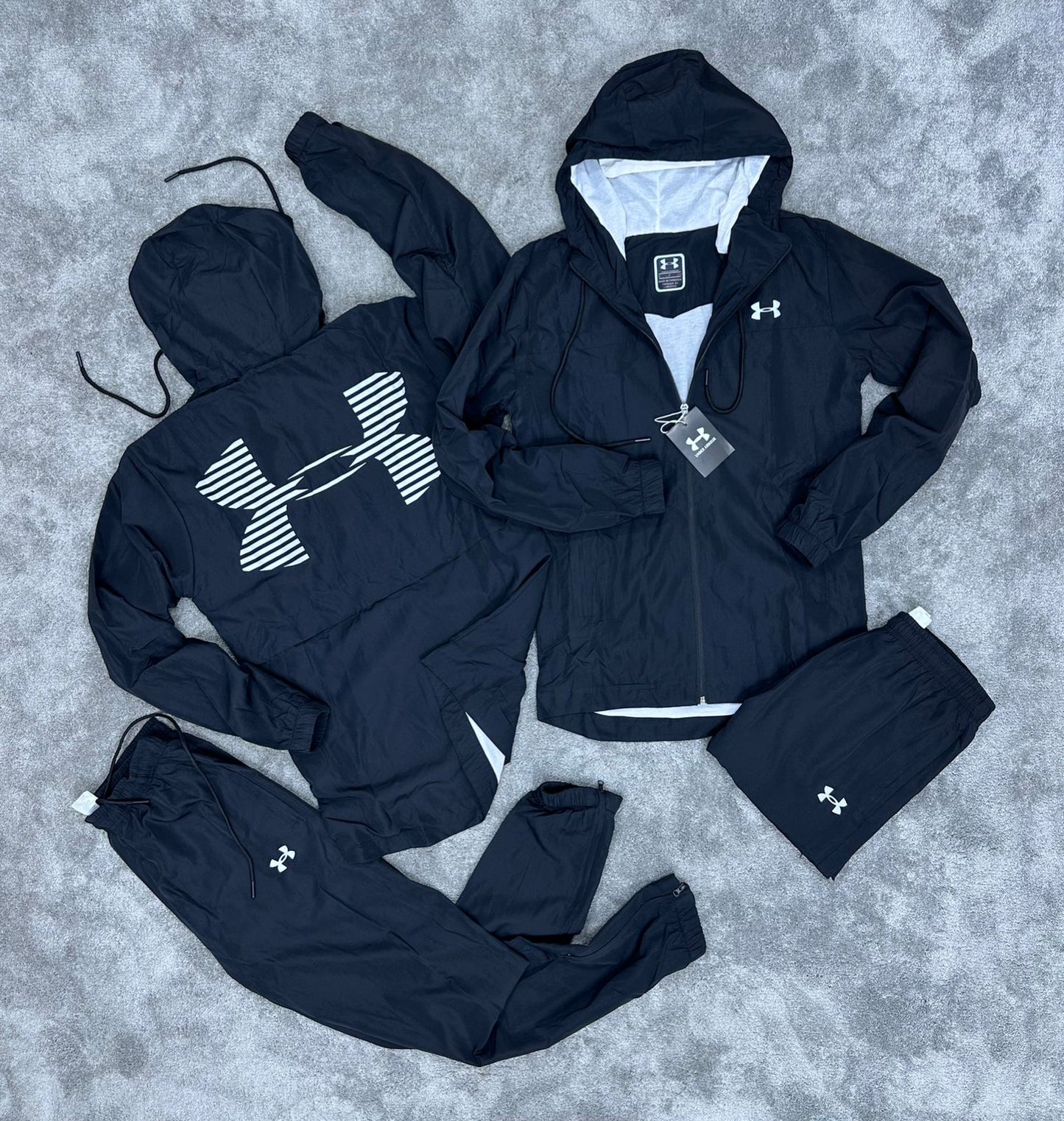 Chandal under armour negro logo blanco reflectante