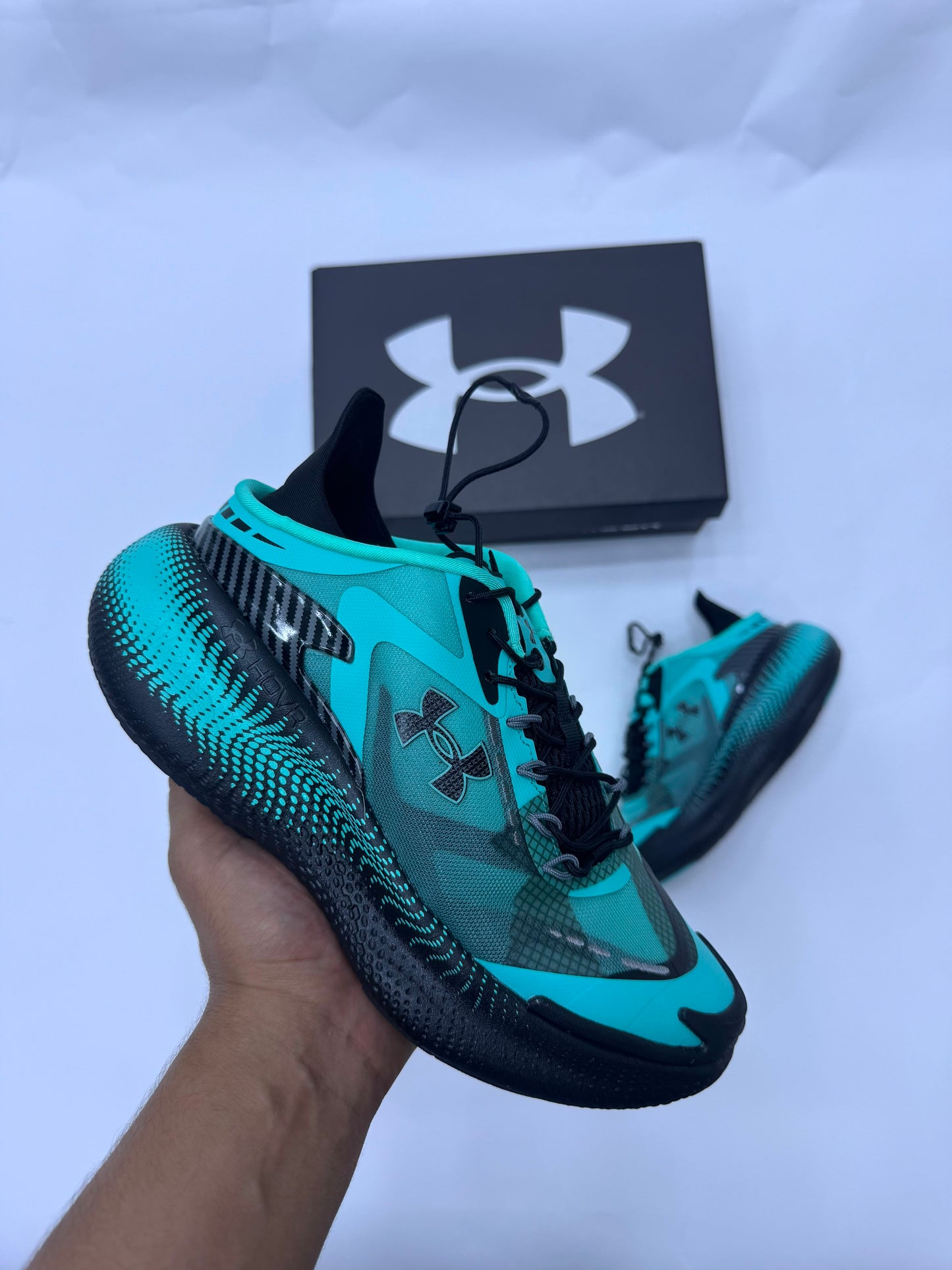 Mansory × Under Armour azules logo negro