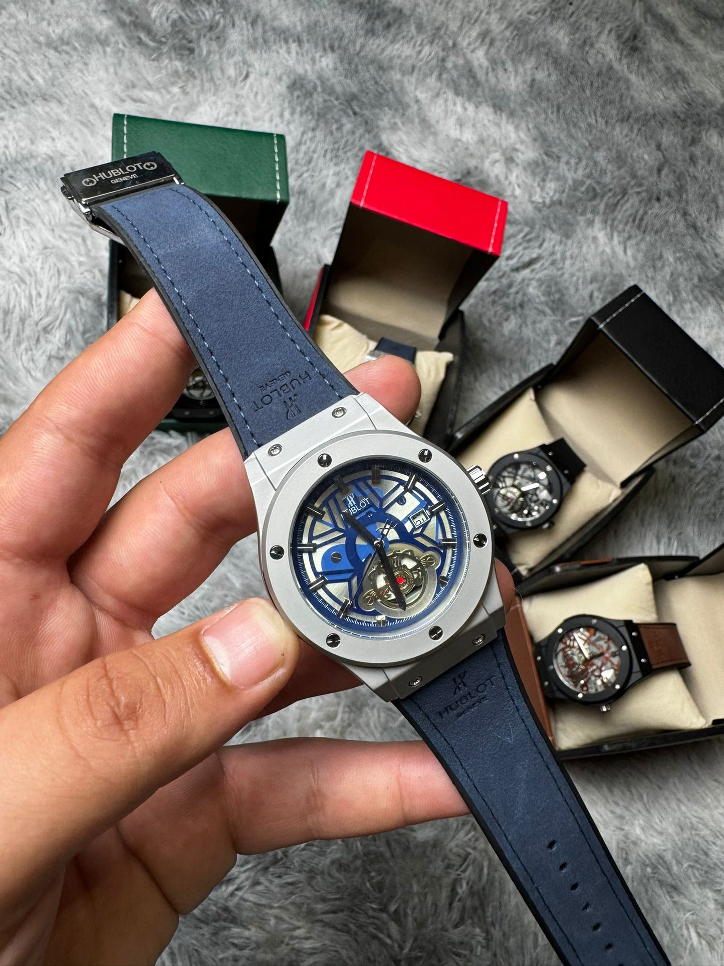 RELOJ HUBLOT gris y azul marino
