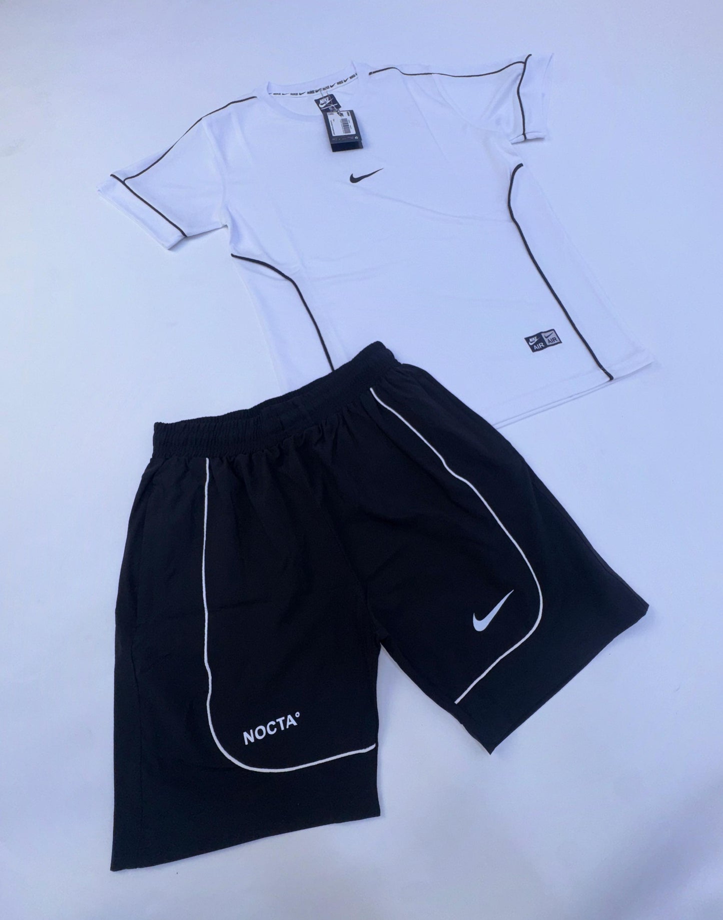 Conjunto corto nike x nocta blanco logo negro lineas negras
