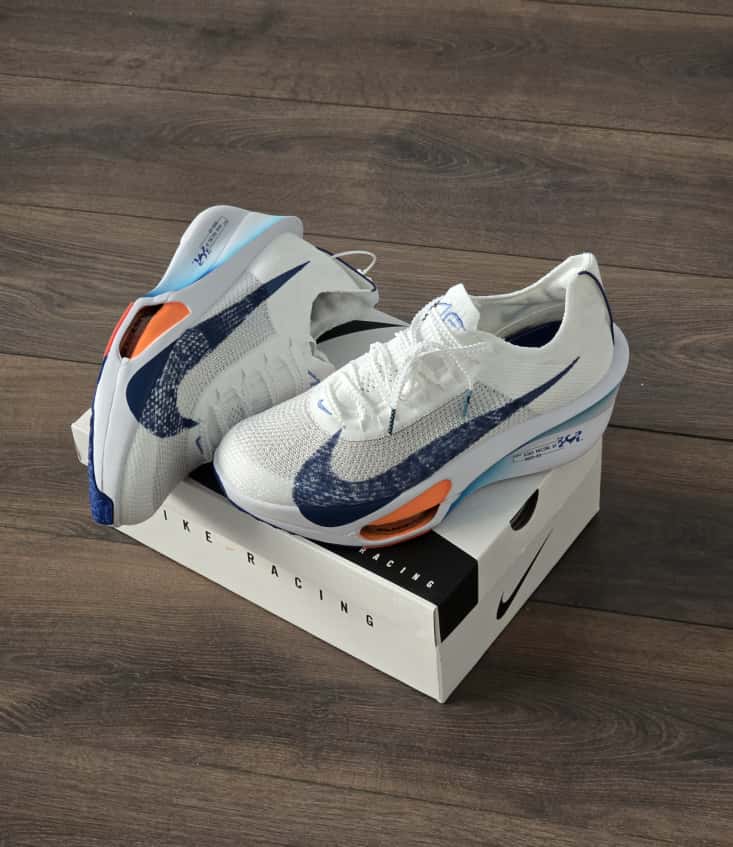 Air zoom blanca logo azul