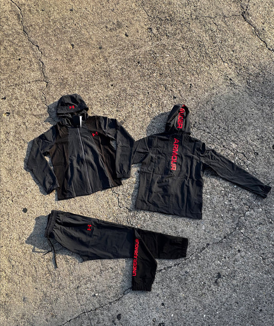 Chandal under armour negro logo rojo