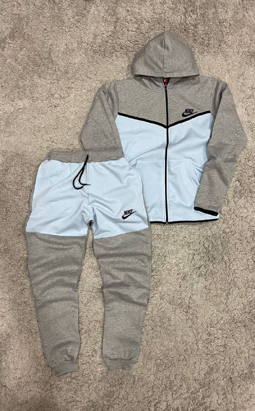 Nike Tech gris y azul claro logo negro lineas negras