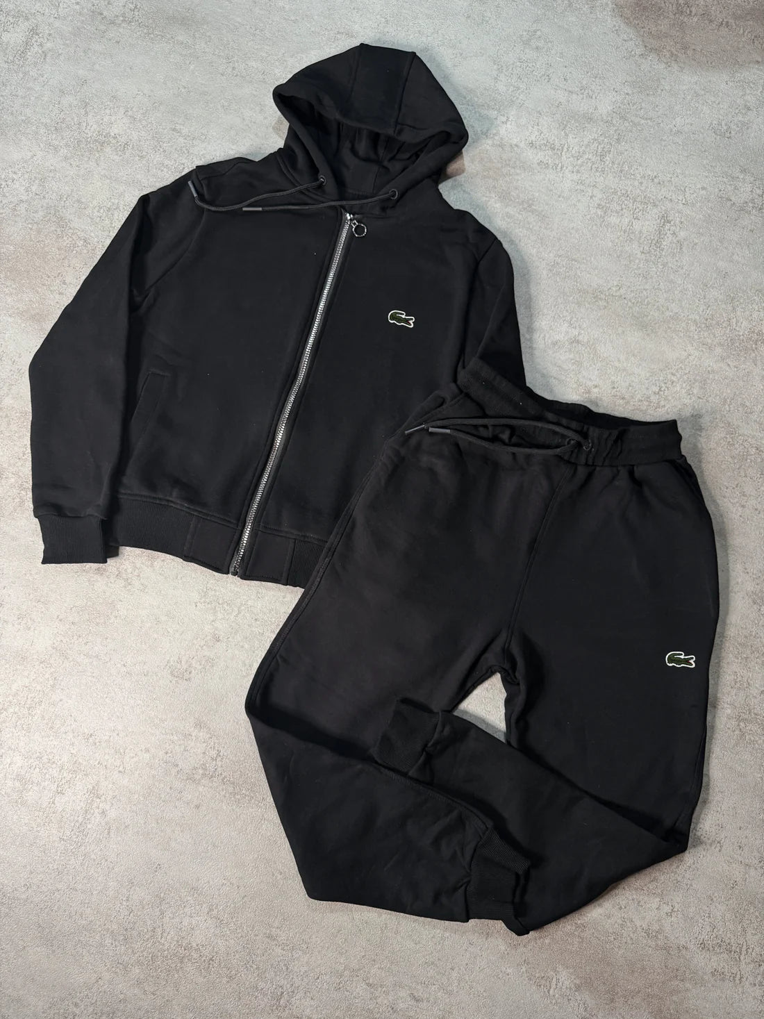 Chandal Lacoste negro logo verde capucha y cremallera