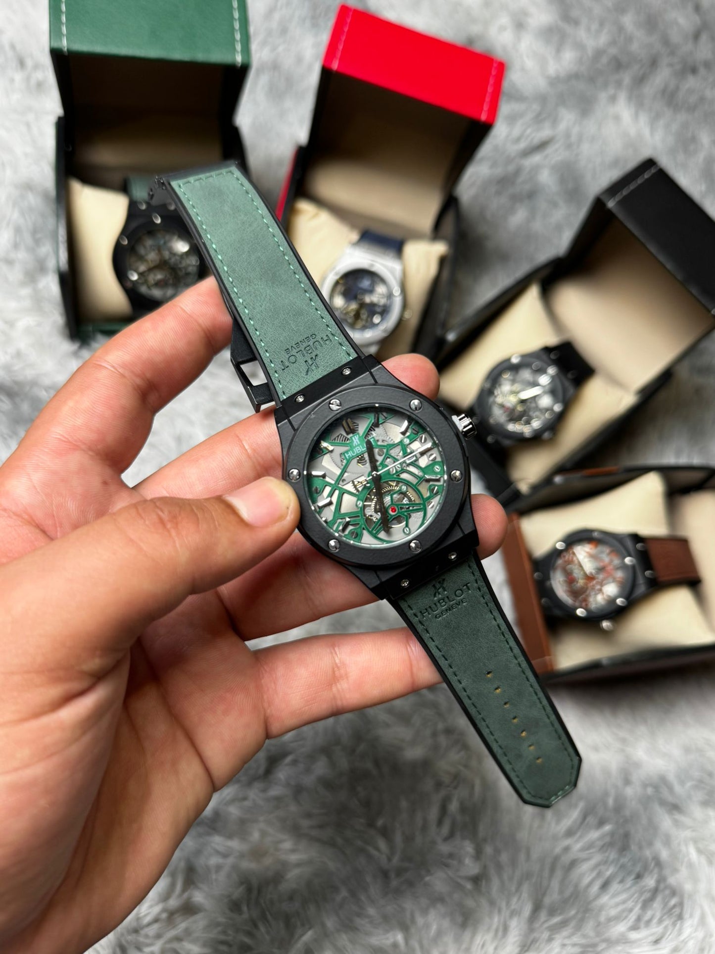 RELOJ HUBLOT negro y verde