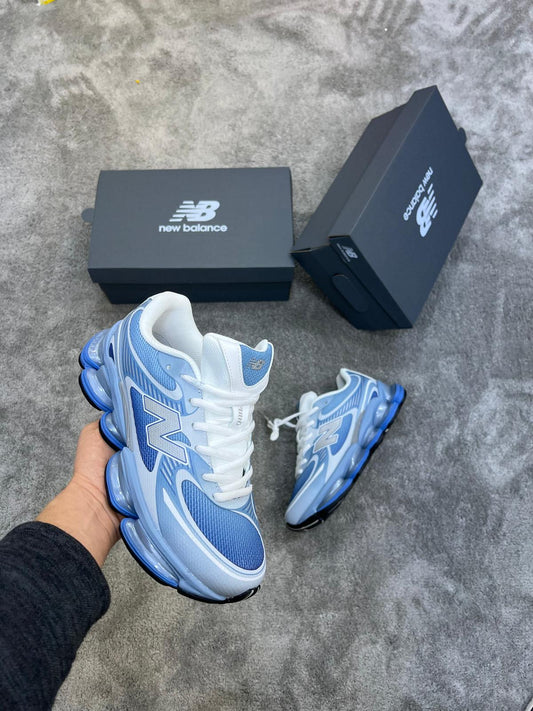 New Balance 2000 azules logo gris