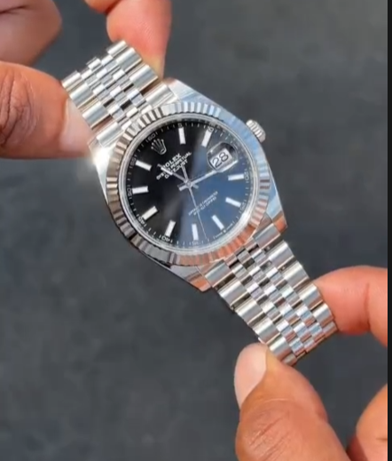 Reloj Rolex plateado y negro automatico