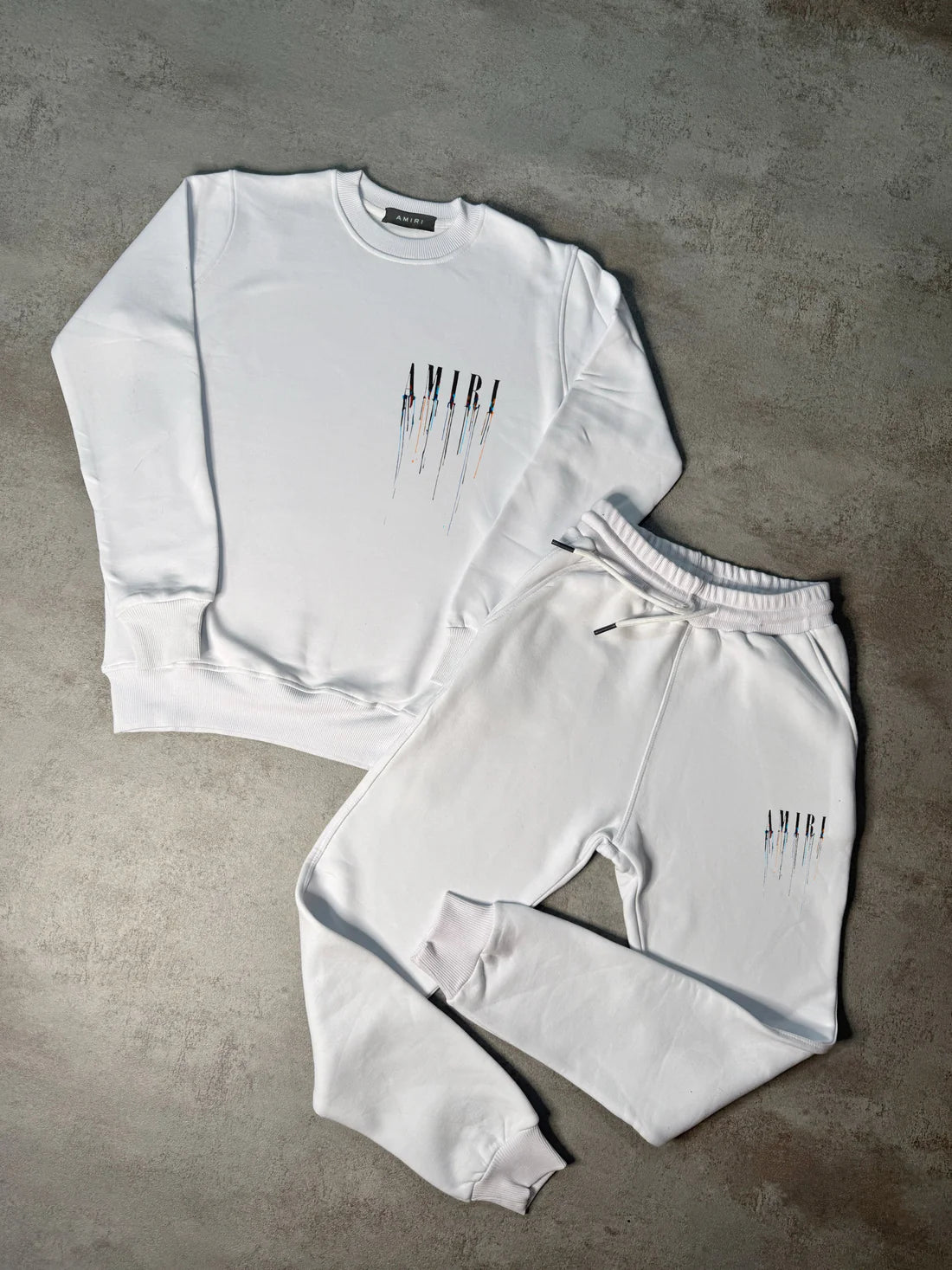 Chandal AMIRI blanco logo negro colores