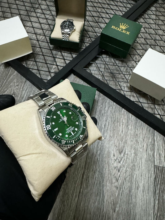 Reloj Rolex plateado verde
