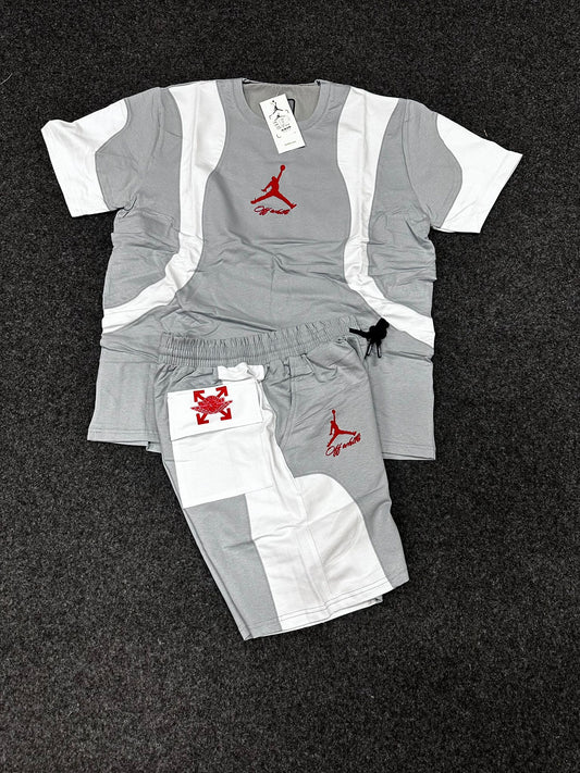 Conjunto jordan gris y blanco logo rojo