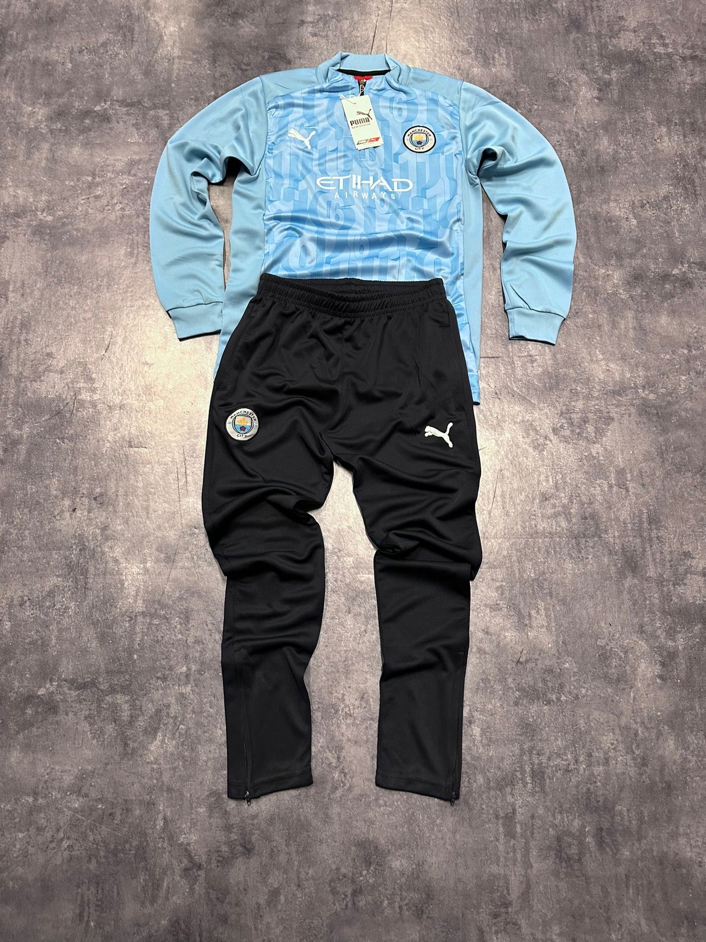 Chandal manchester city azul y negro