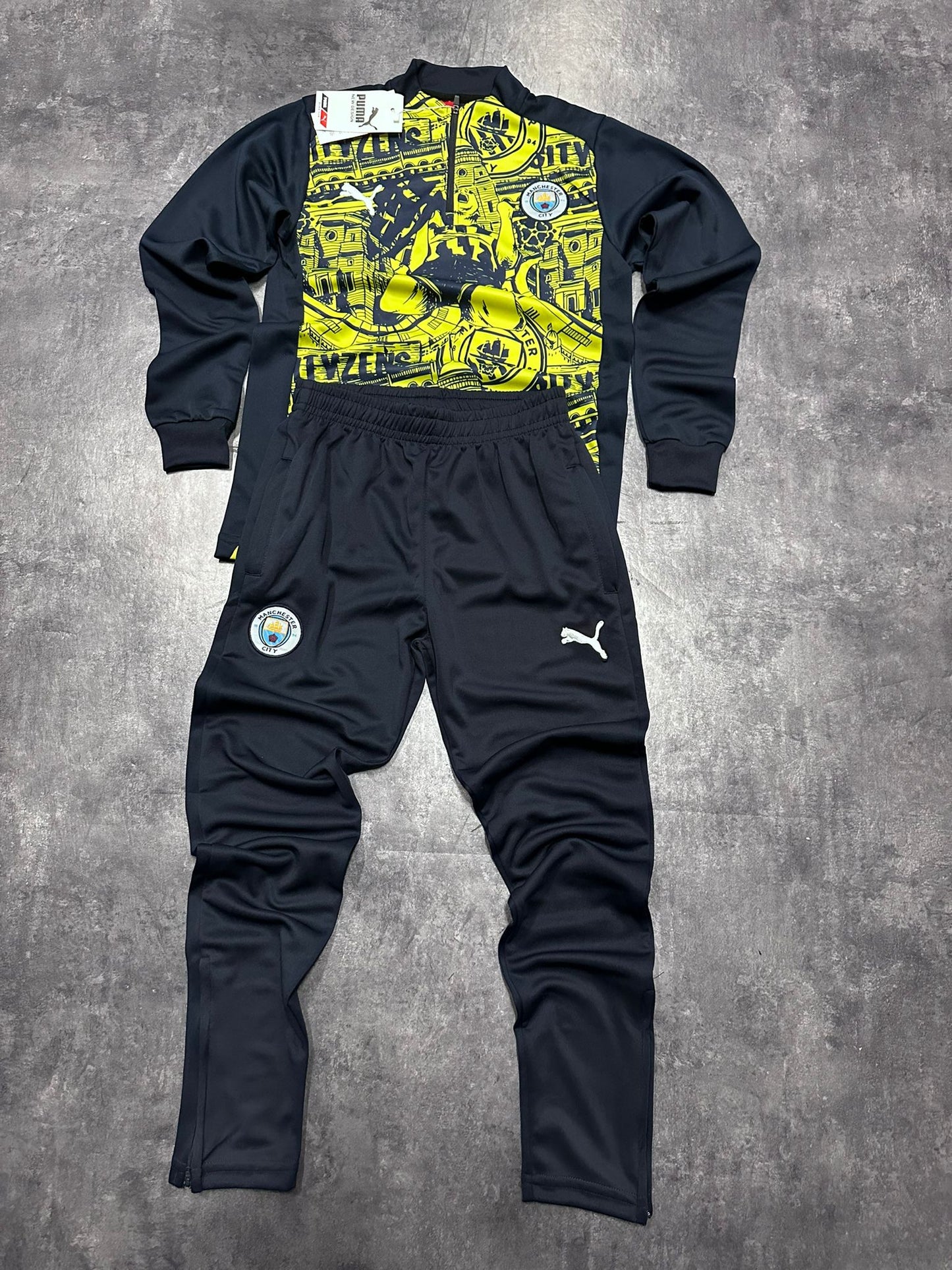 Chandal manchester city negro y amarillo