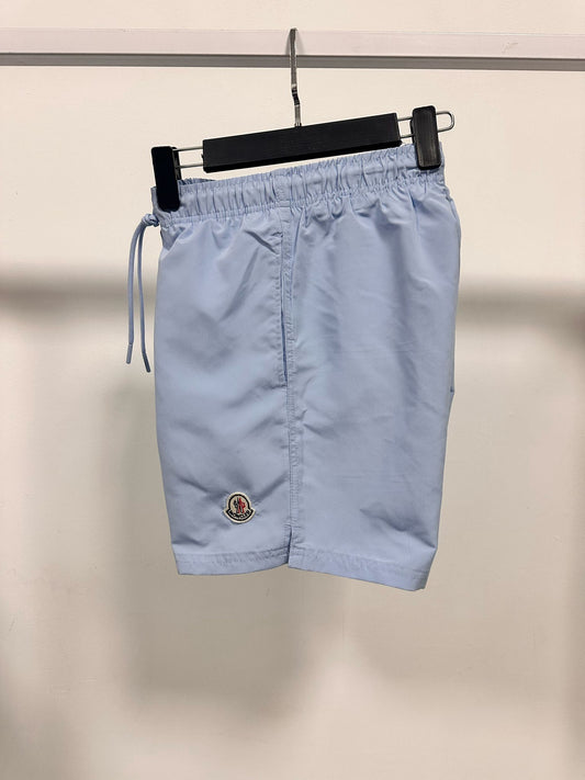 Bañador Moncler azul claro logo blanco