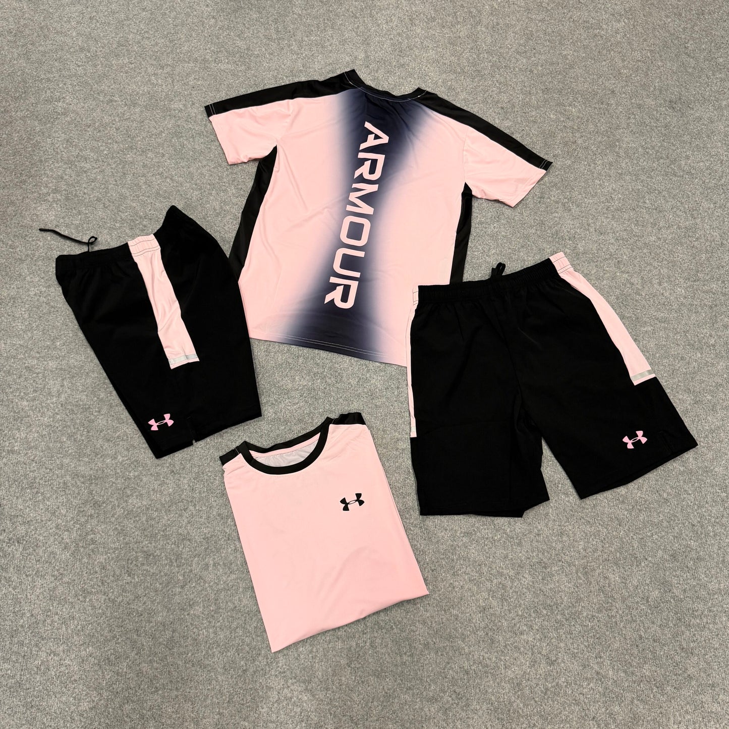 Conjunto under armour rosa y negro