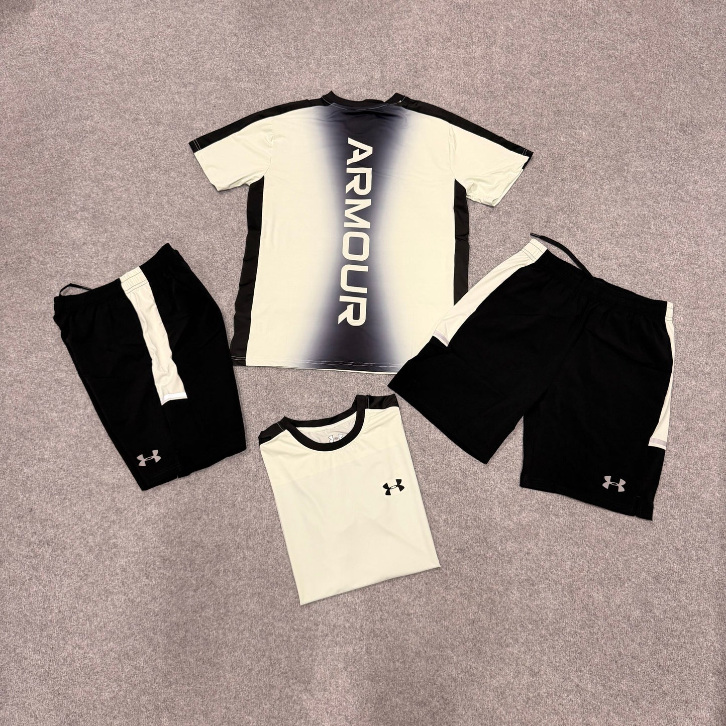 Conjunto under armour verde claro y negro detalles grises