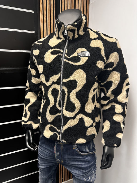 Chaqueta North Face negro y beige logo blanco