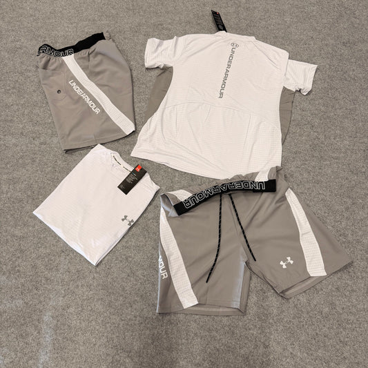 Conjunto under armour gris y blanco detalles negros