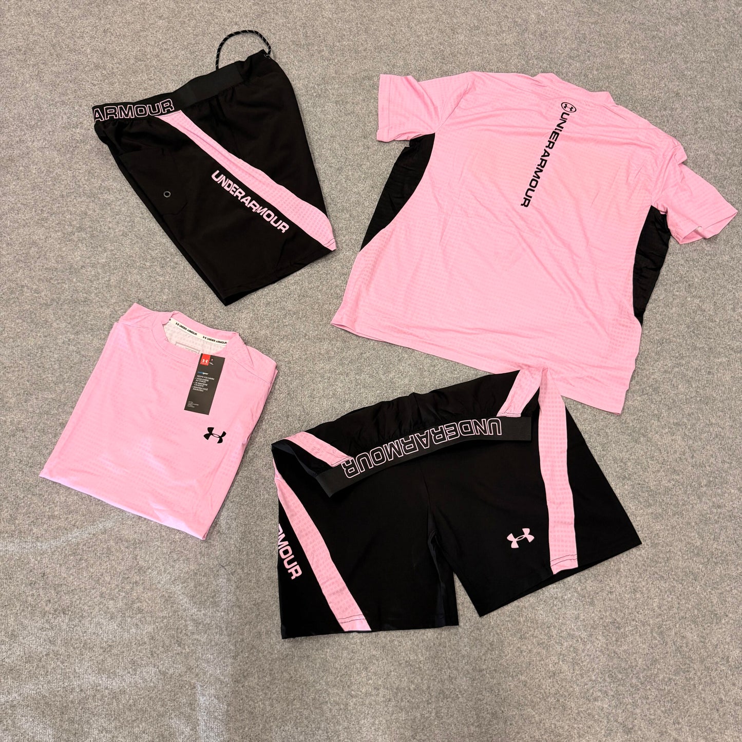 Conjunto under armour negro y rosa