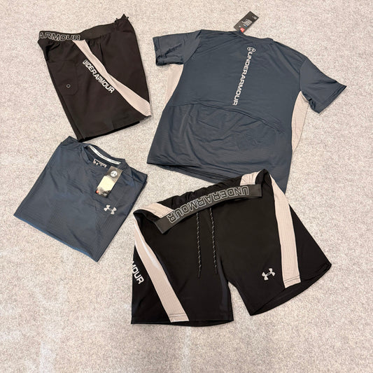 Conjunto under armour gris oscuro y negro detalles blancos