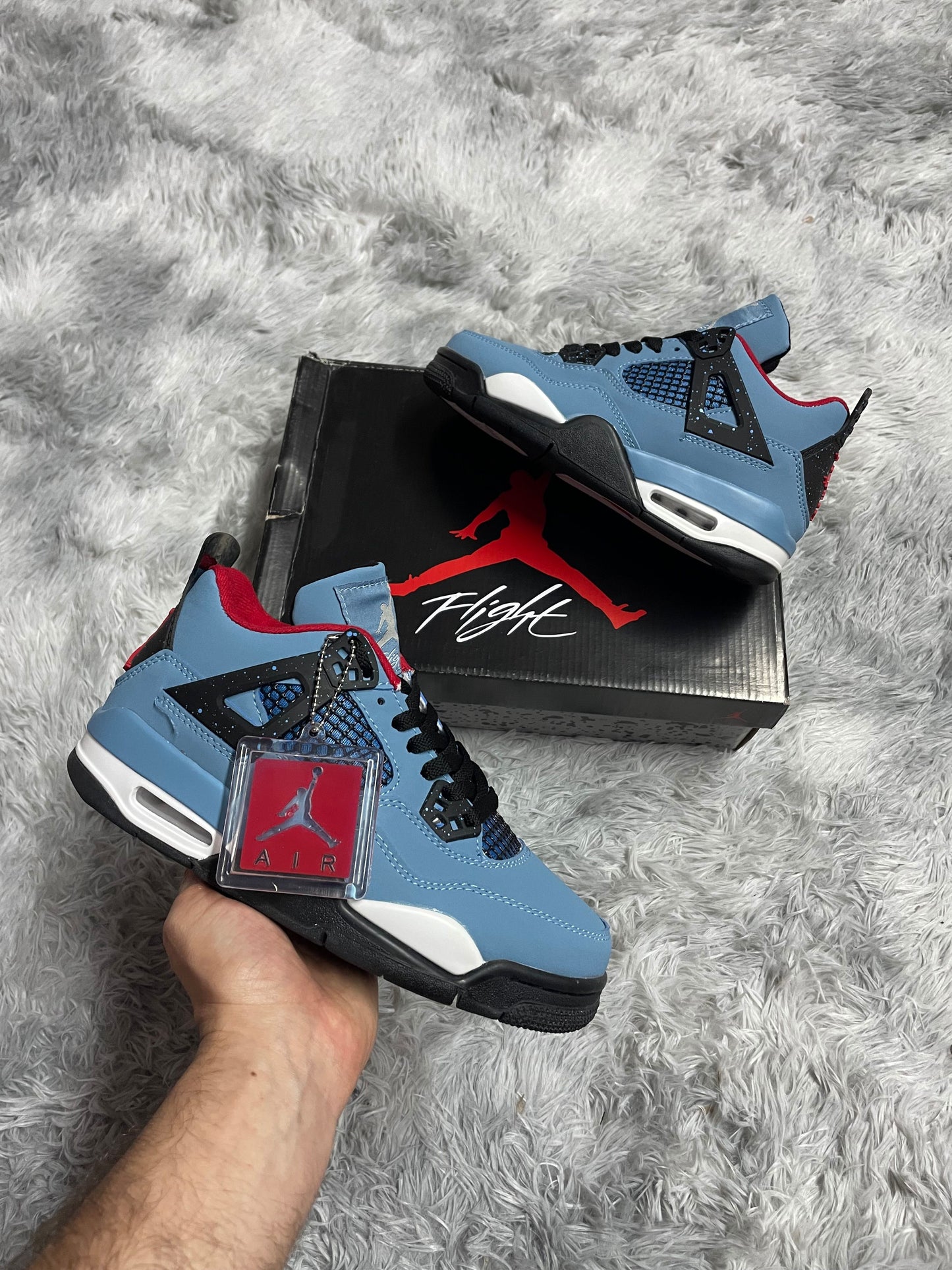 JORDAN 4 AZUL Y NEGRAS