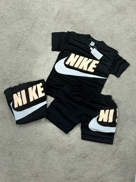 Conjunto nike negro logo blanco y azul reflectante