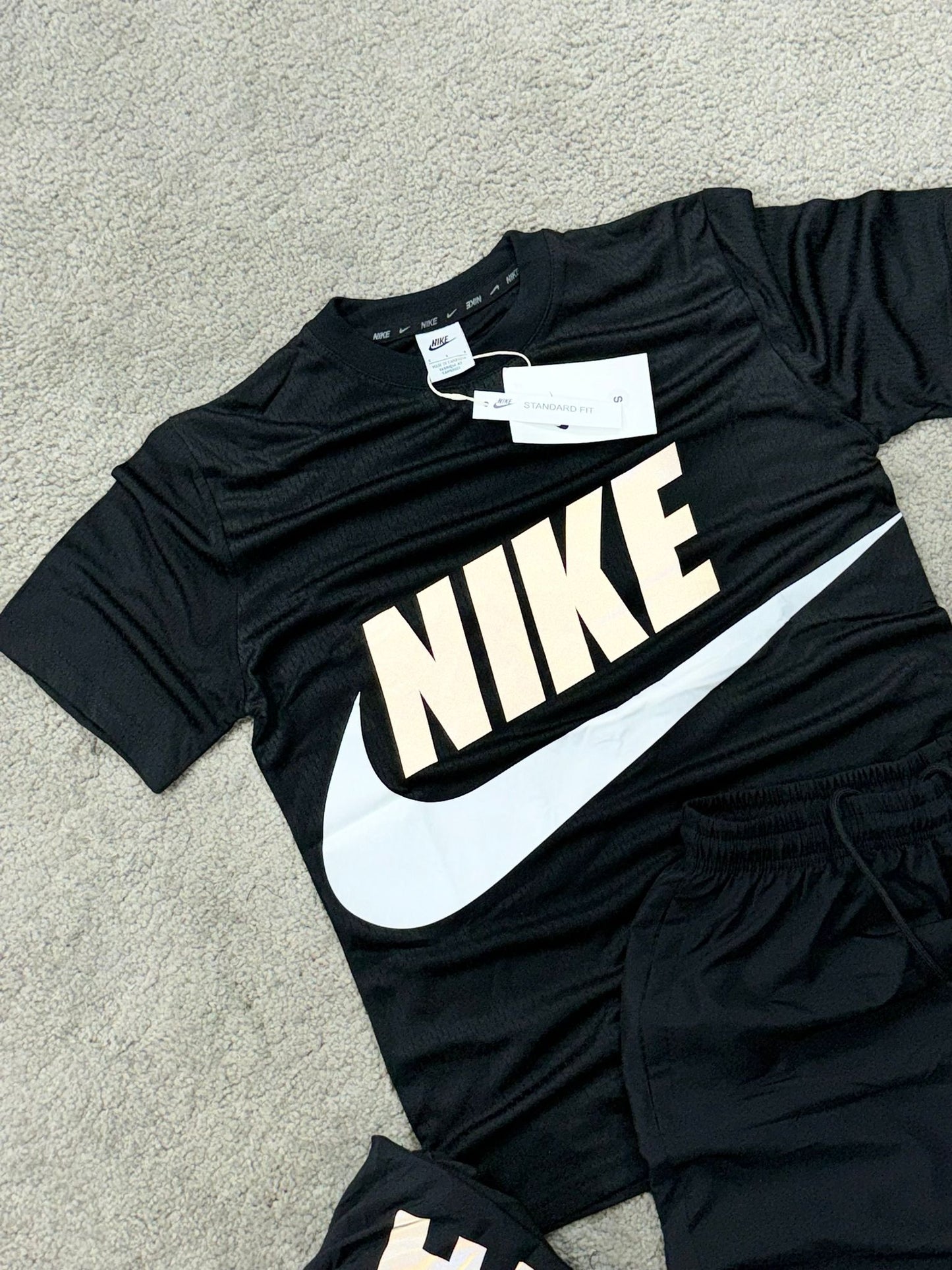 Conjunto nike negro logo blanco y azul reflectante