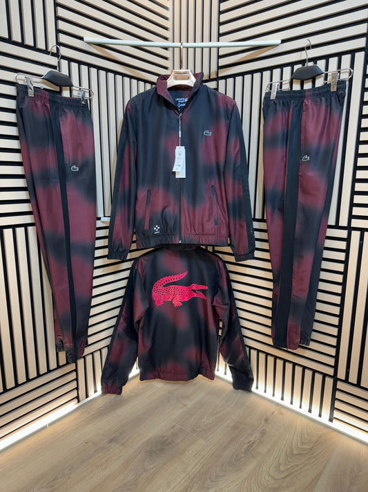 Chandal LACOSTE rosa y negro logo verde