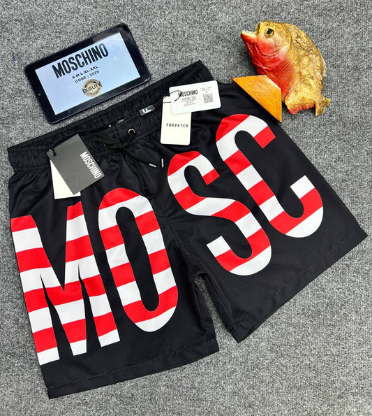 Bañador Moschino negro logo blanco y rojo