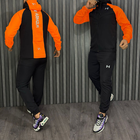 Chandal under armour naranja y negro logo blanco