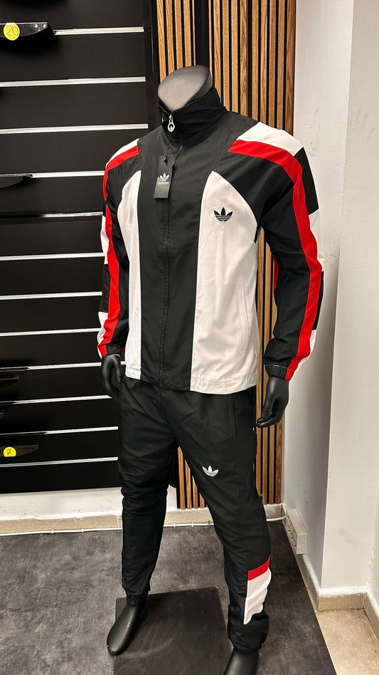 Chandal Adidas negro y blanco detalles rojos