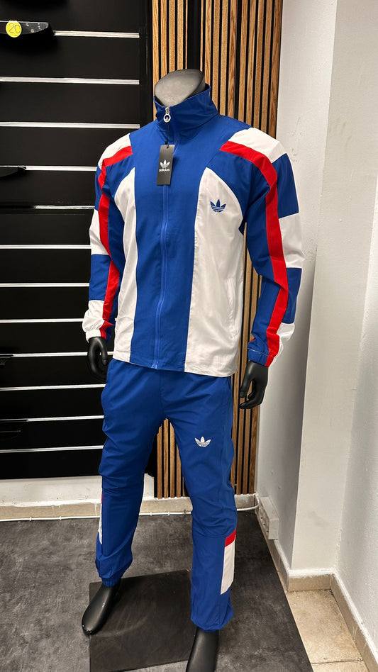 Chandal Adidas azul y blanco detalles rojos