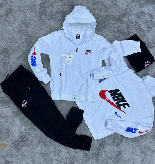 Chandal Nike blanco logo negro y rojo detalles azules