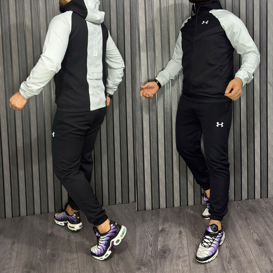 Chandal under armour gris claro y negro logo blanco