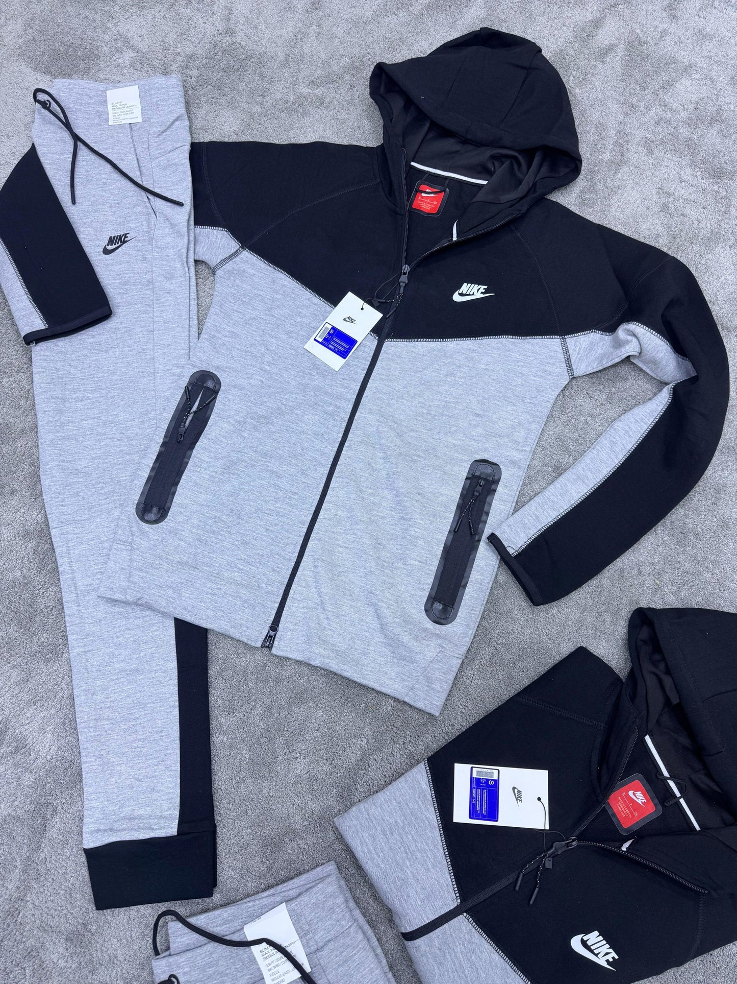 Chandal Nike Tech gris y negro logo blanco