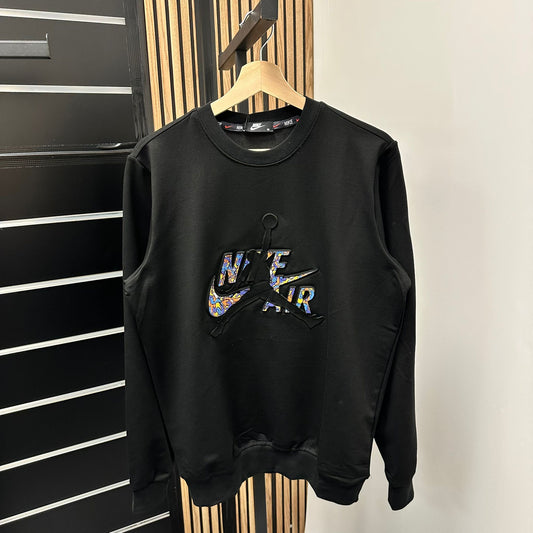 Sudadera Nike negro logo multicolor