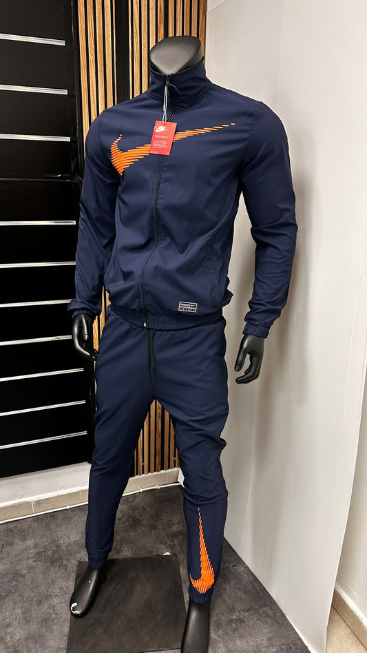 Chandal nike air azul marino logo naranja