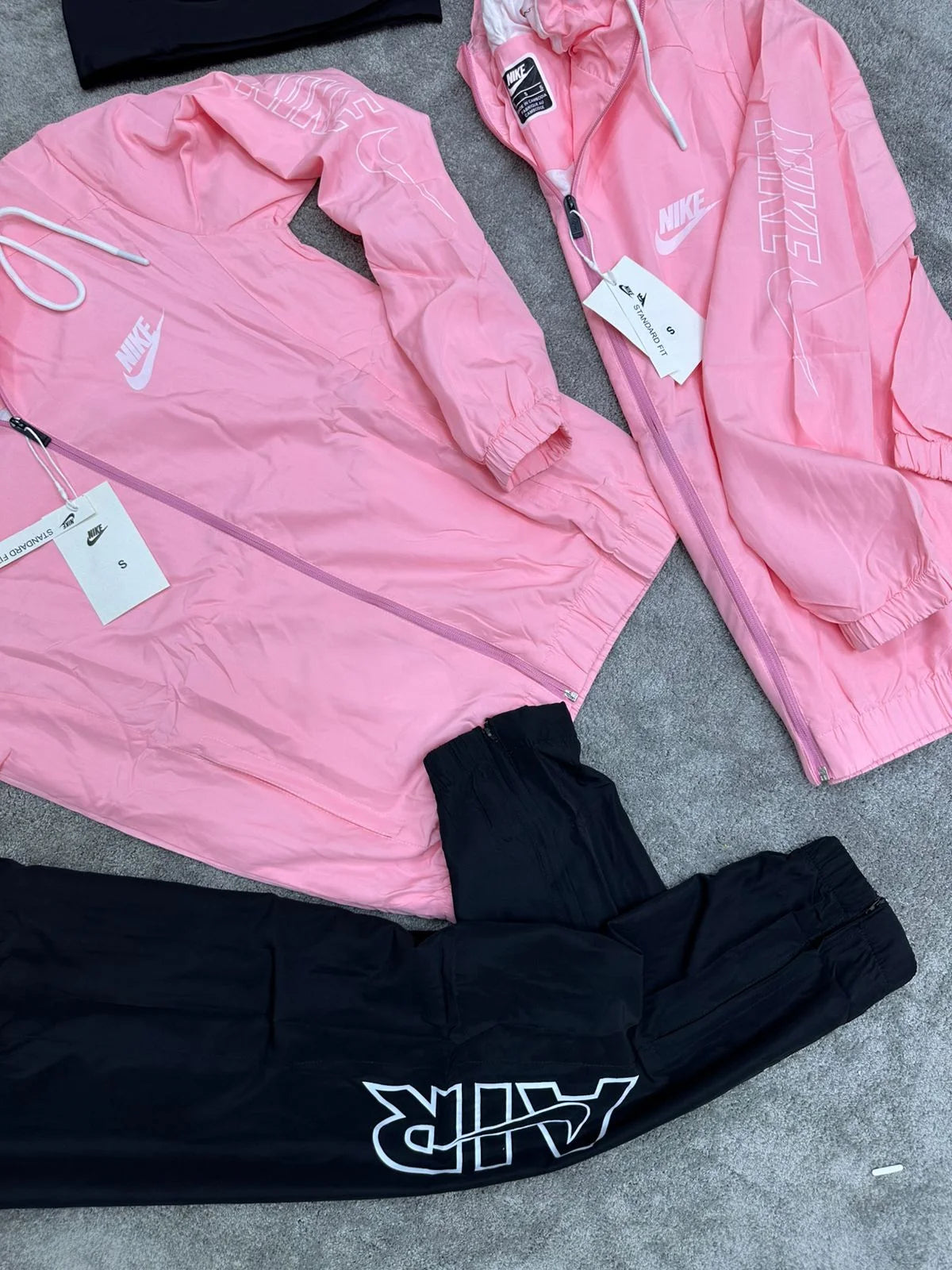 Chandal nike rosa logo blanco