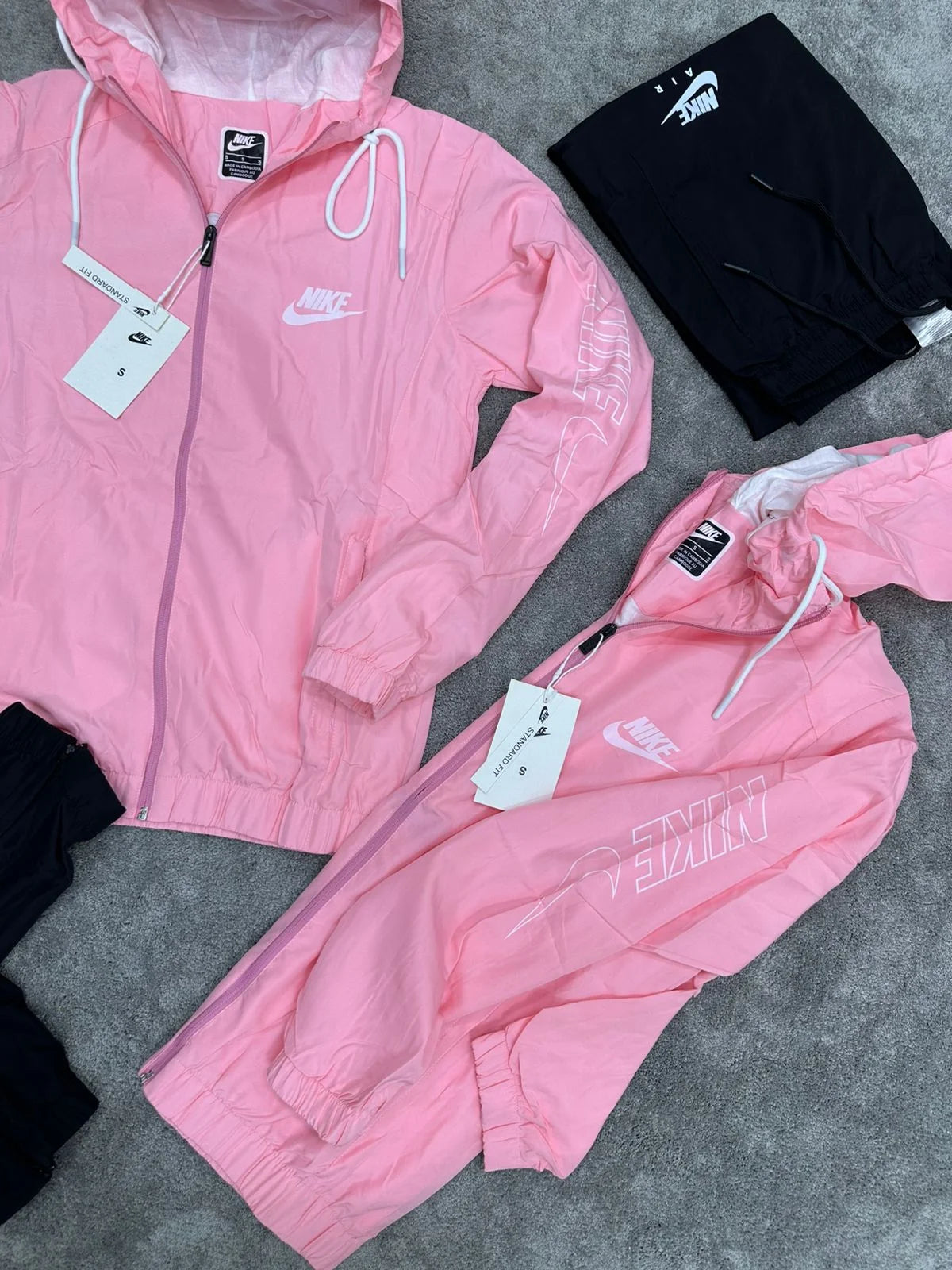 Chandal nike rosa logo blanco