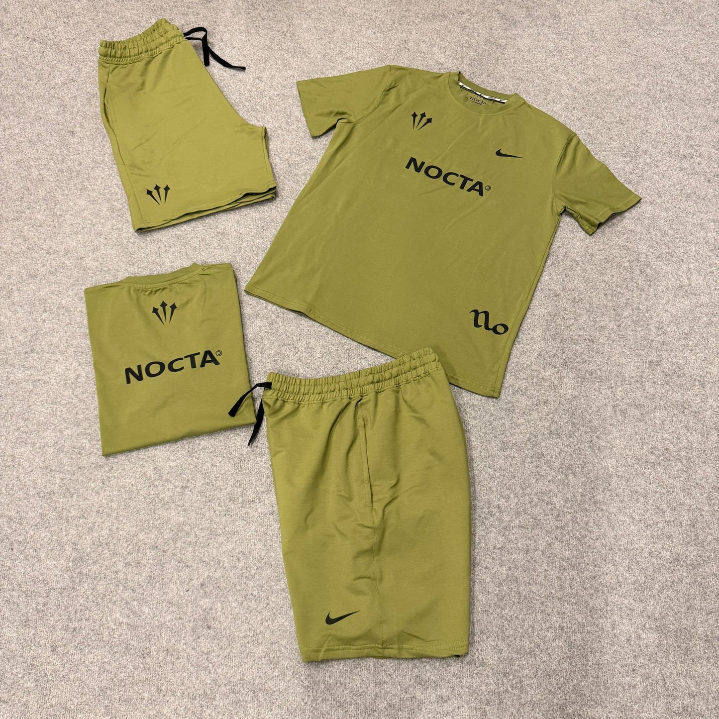 Conjunto nike nocta verde oscuro logo negro